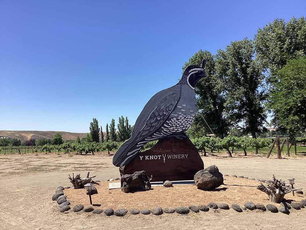 A large quail sign for the winery at Y KNOT WINERY & RV PARK