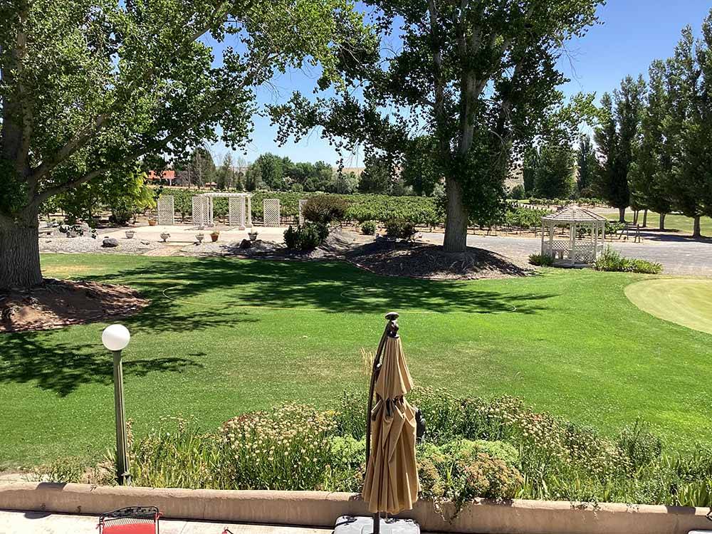 A gazebo next to a grassy area at Y KNOT WINERY & RV PARK