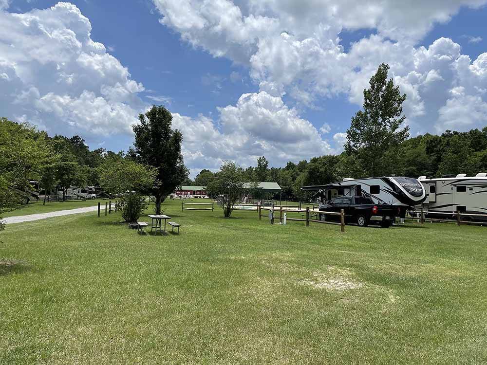 A group of grassy RV sites at River Bottom Farms Family Campground