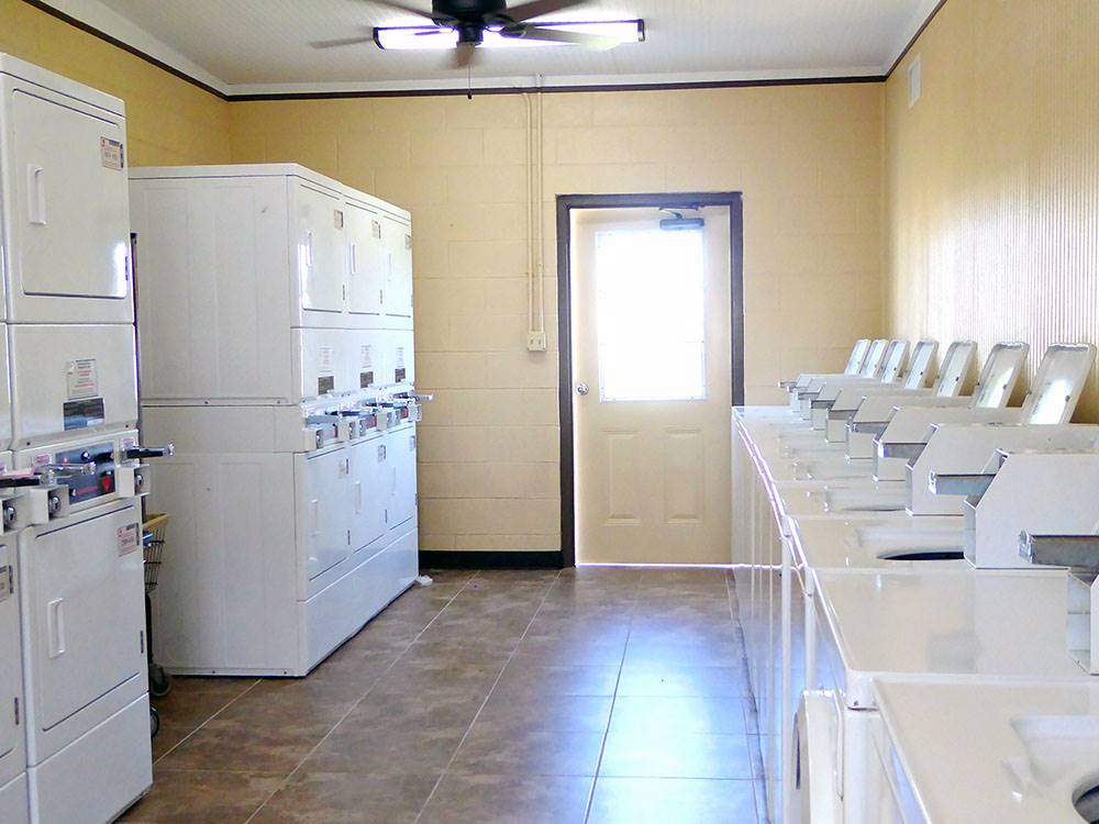 Washers and dryers in the laundry room at SNOW TO SUN RV RESORT