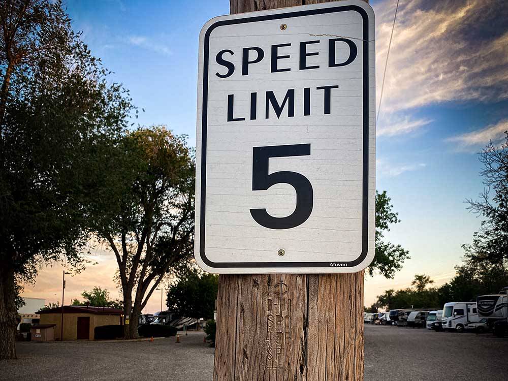 The speed limit sign on a light pole at TRAILER VILLAGE RV PARK