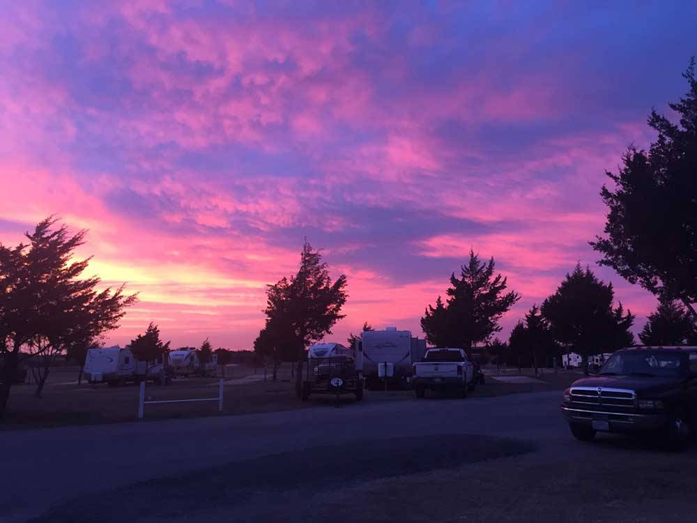 Purple and pink sunset at dusk at CEDAR VALLEY RV PARK
