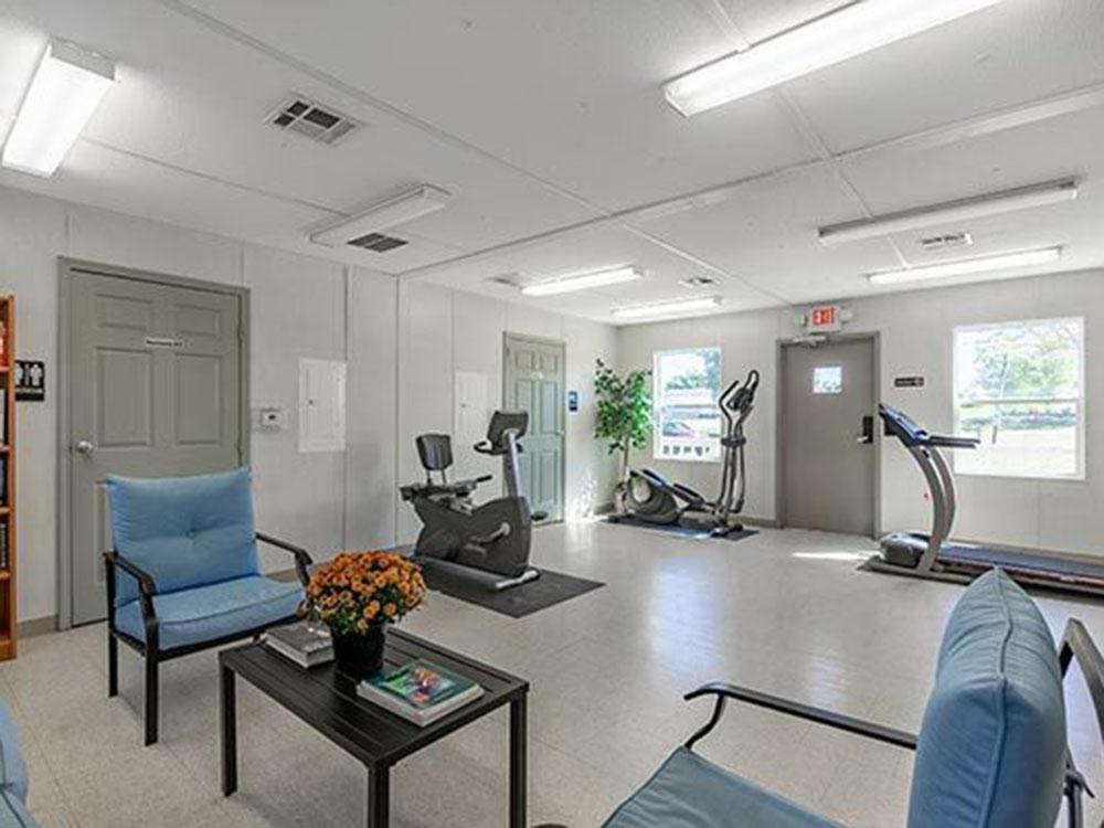 Exercise equipment in the library room at SWAN CREEK COMMUNITY (MHP)