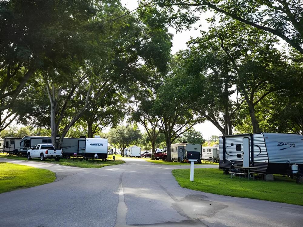 Parked trailers at site Winners Circle RV Resort