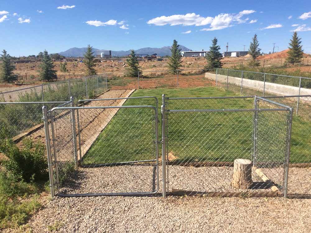 The fenced in pet area at BLUE MOUNTAIN RV AND TRADING