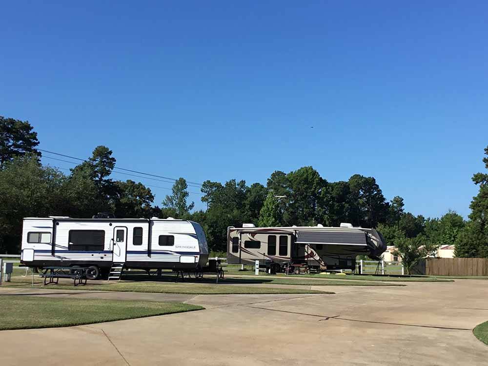 A line of paved RV sites at SHADY PINES RV PARK