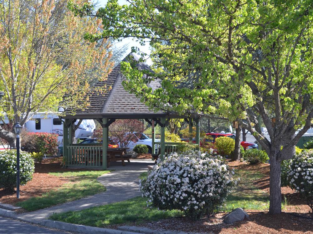 Large gazebo among shade trees at JACK'S LANDING RV RESORT