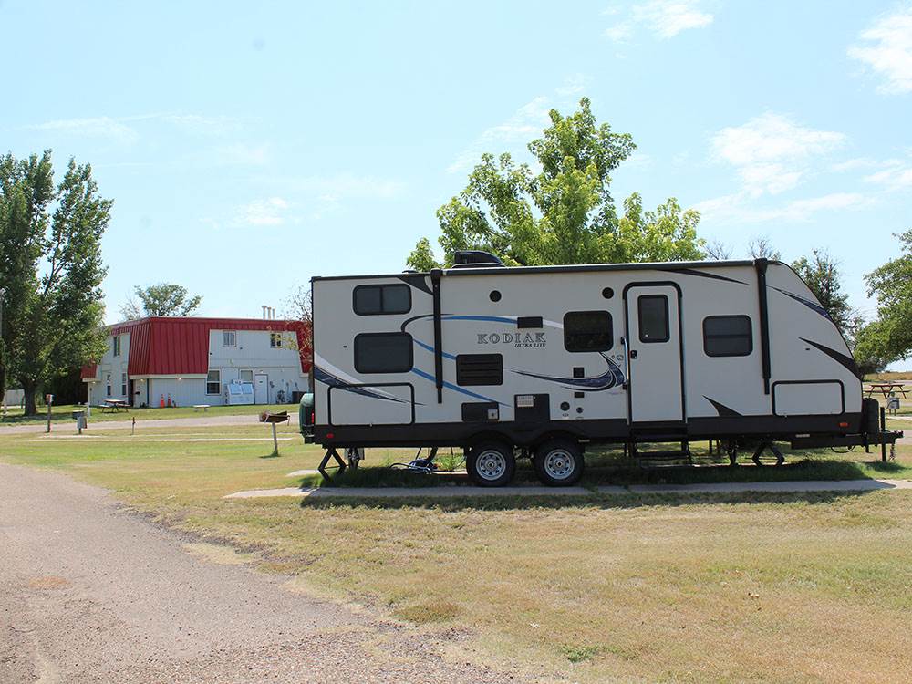 A travel trailer at a site