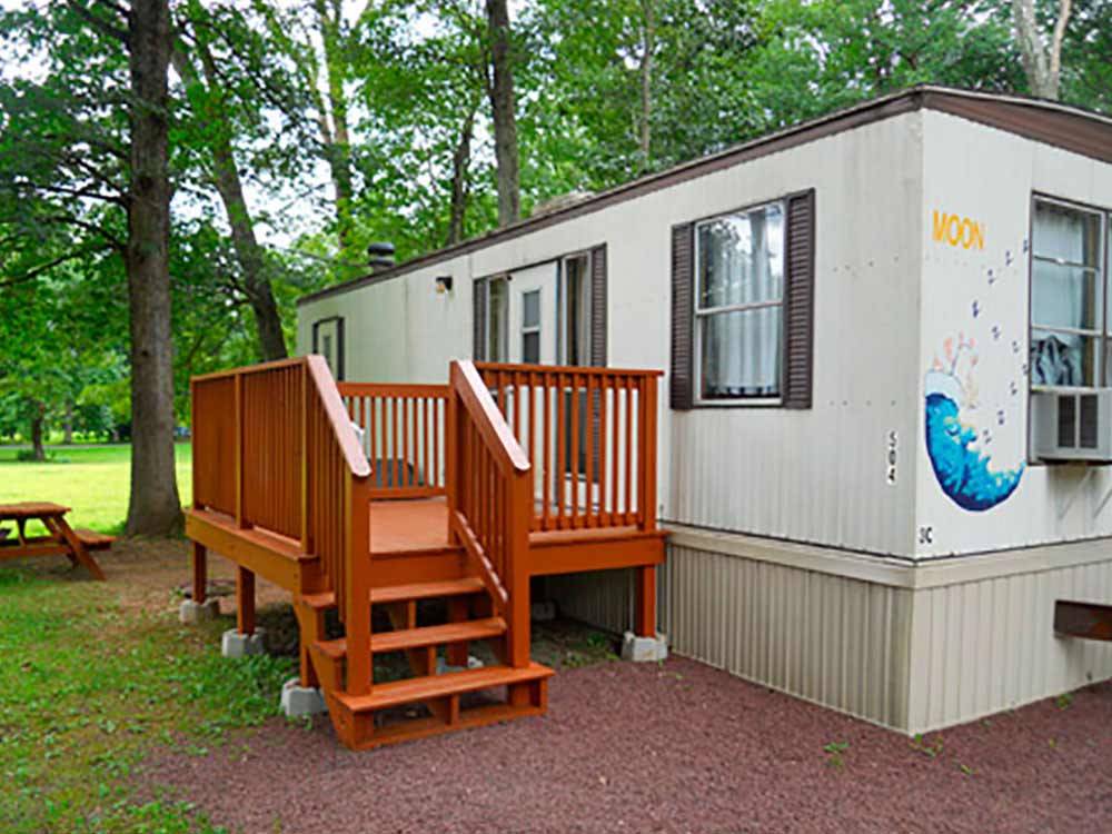 Trailer with deck at ECHO VALLEY CAMPGROUND