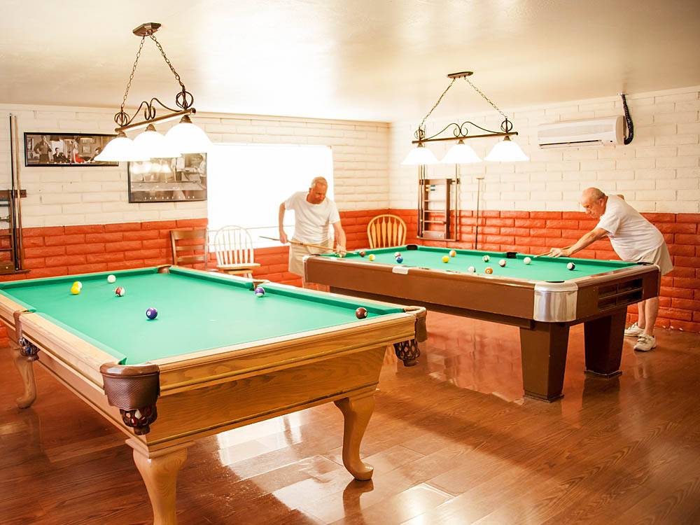 Pool tables in game room at ENCORE CAPRI