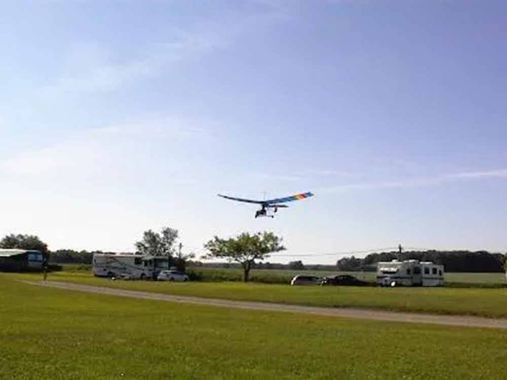 A glider landing at the campground at ADIRONDACK GATEWAY CAMPGROUND