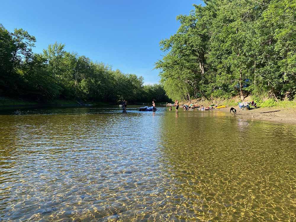 People enjoying the river at SCHROON RIVER CAMPGROUND & LODGING