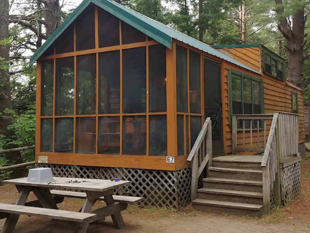 The front view of the cabin rental at SCHROON RIVER CAMPGROUND & LODGING