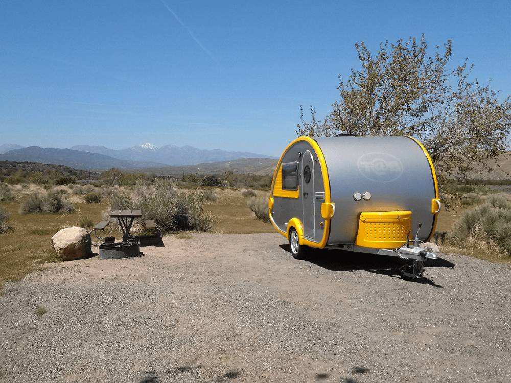 RV parked on gravel lot