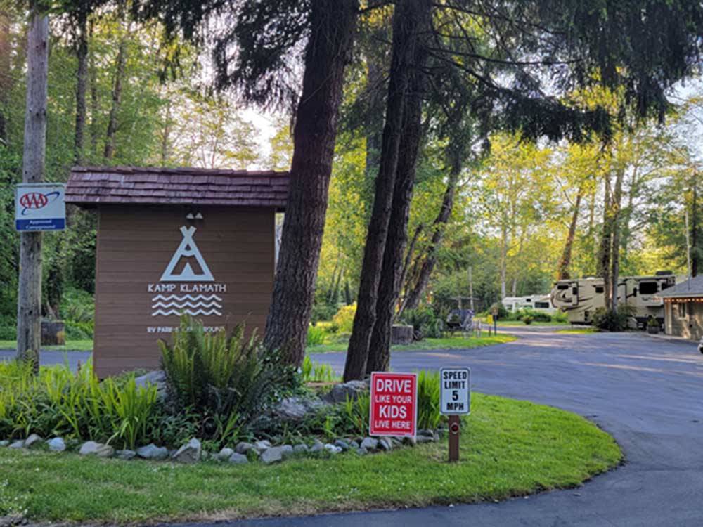 The front entrance sign and driveway at KAMP KLAMATH RV PARK  CAMPGROUND
