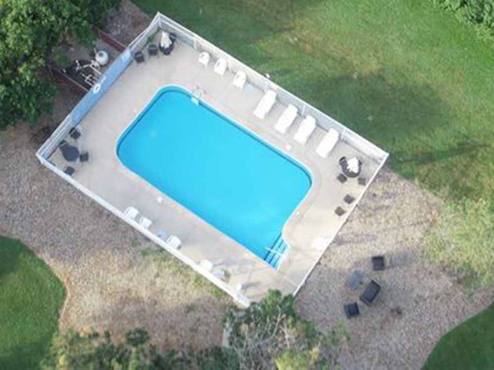 An aerial view of the swimming pool at KAMP KOMFORT RV PARK & CAMPGROUND