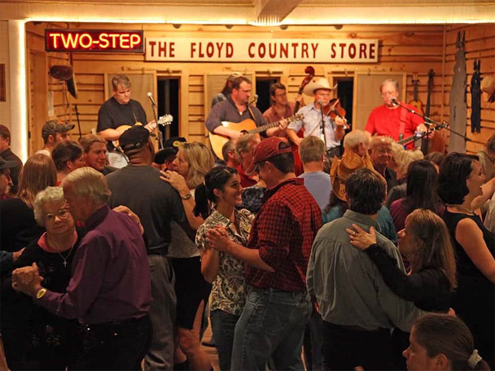 A band playing and people dancing