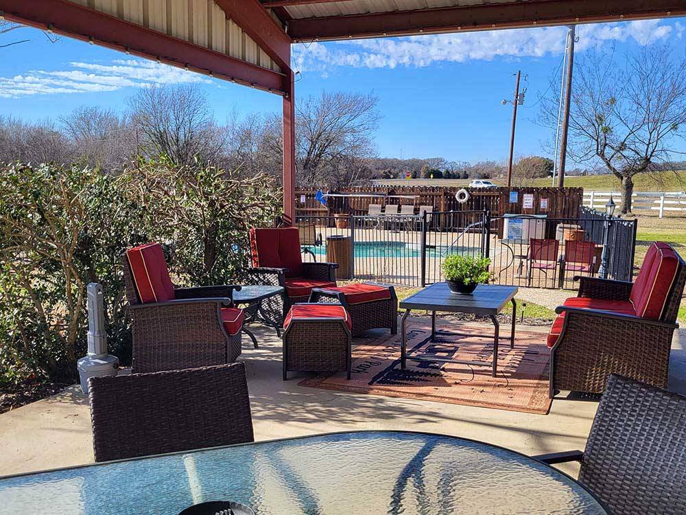 Couches and tables under a pavilion at CANTON I-20 RV PARK