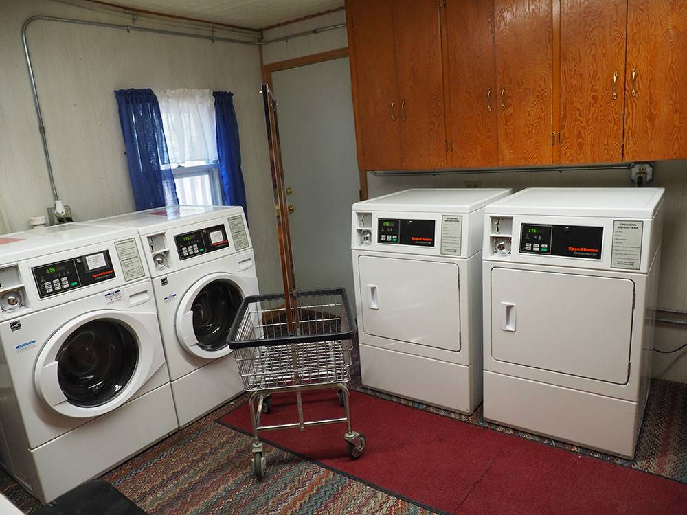Laundry facility with washers, dryers and cart at DEER GROVE RV PARK