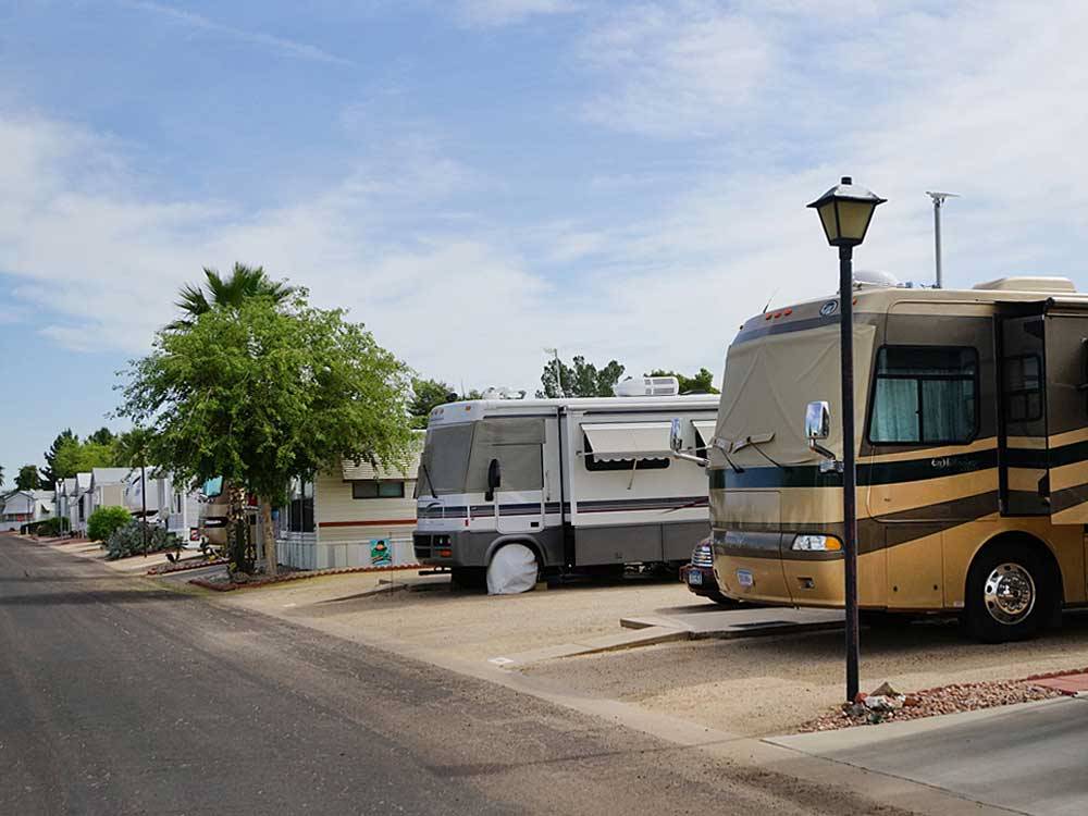 RVs and trailers at campground at ENCORE PARADISE RV