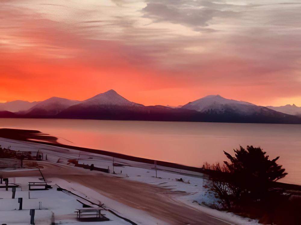 Waterfront at sunset at Driftwood Inn & RV Park