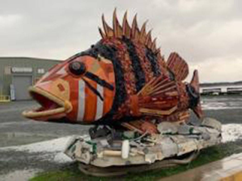 A large statue of a fish at BANDON BY THE SEA RV PARK