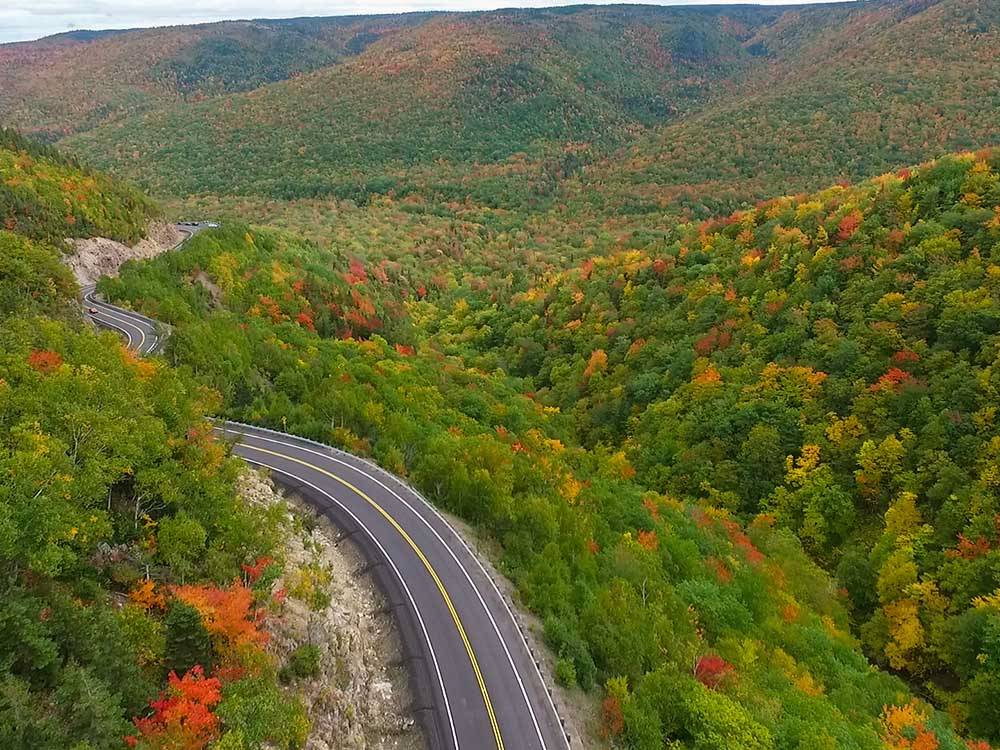 An aerial view of the winding road nearby at ADVENTURES EAST CAMPGROUND & COTTAGES