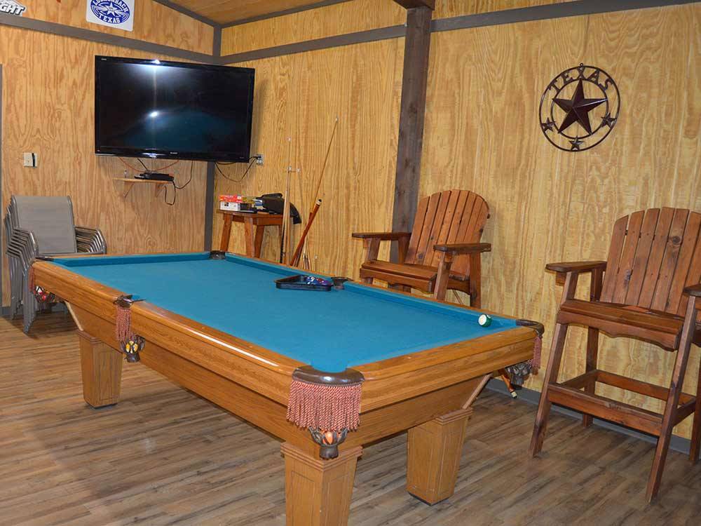 Pool table in game room at TEXAN RV RANCH