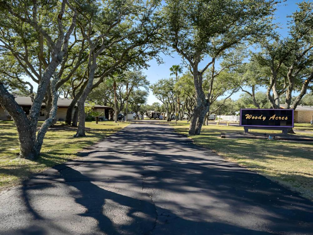 Welcome sign at Woody Acres Mobile Home & RV Resort