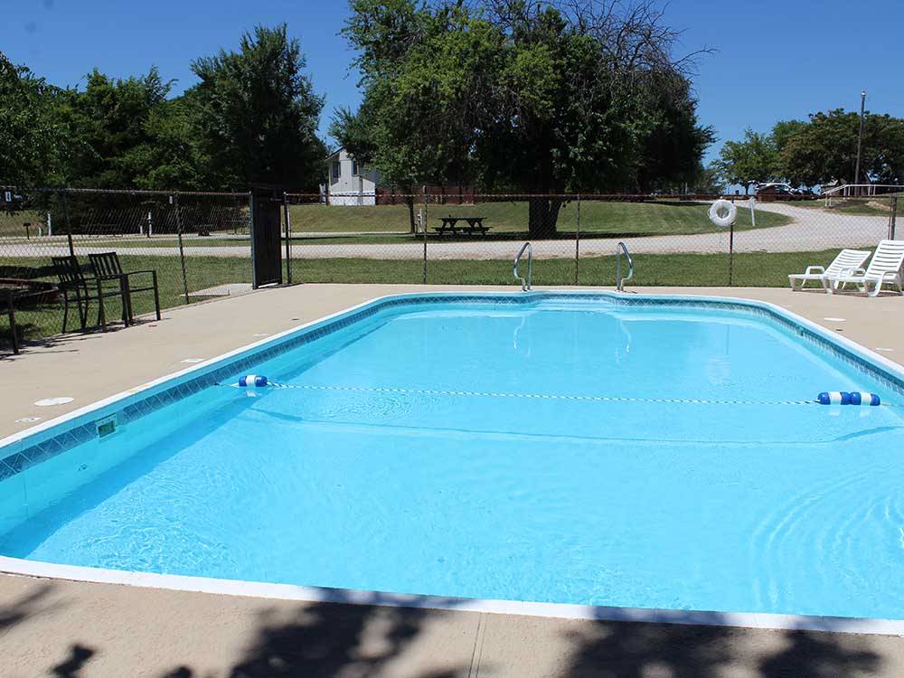 The swimming pool area at ARBUCKLE RV RESORT
