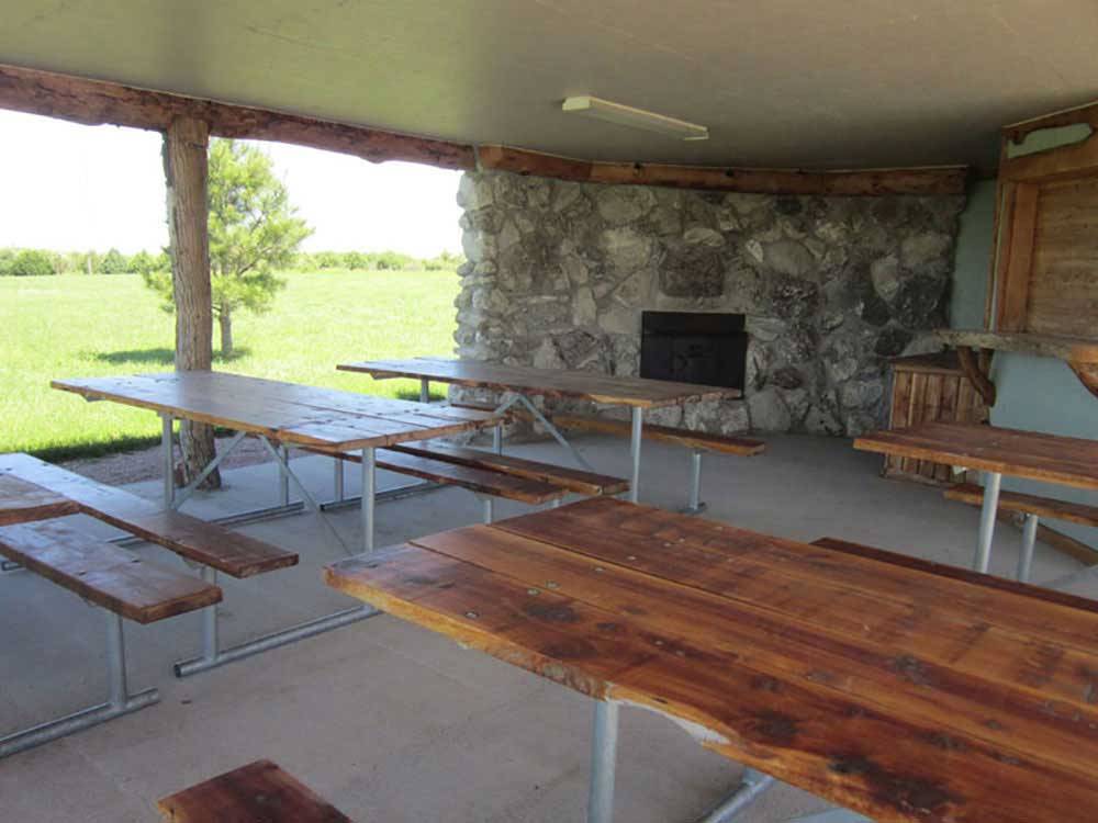 Patio area with picnic tables at FISHBERRY CAMPGROUND