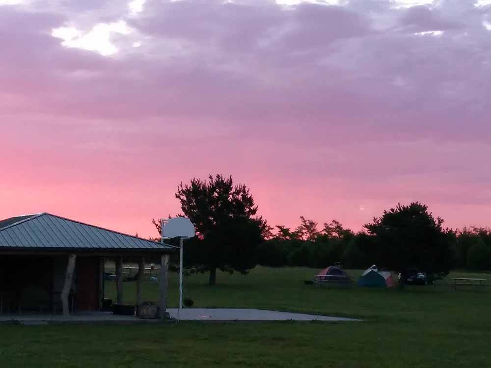 The basketball court at dusk at FISHBERRY CAMPGROUND