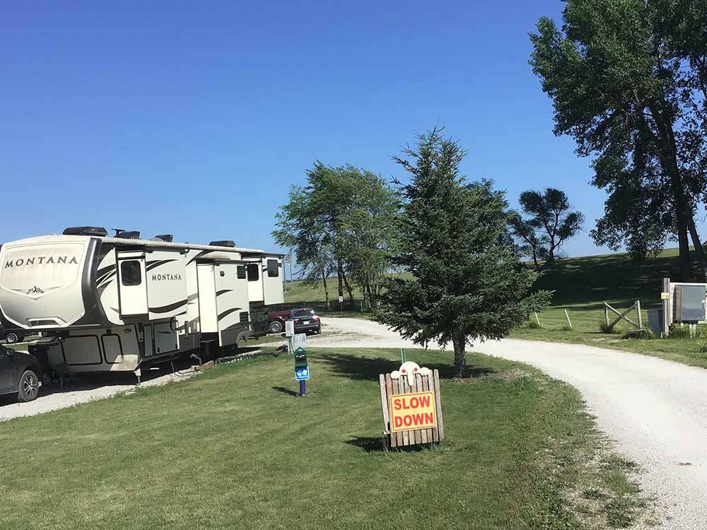 Sign asking campers to slow down at BEYONDER GETAWAY AT LAZY ACRES