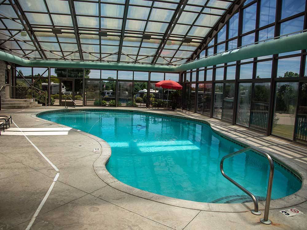 The screened in swimming pool at EVERGREEN PARK RV RESORT