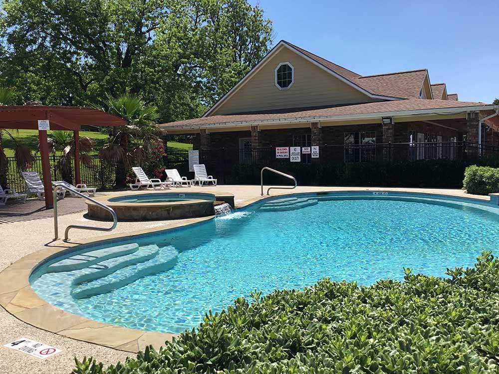 Pool and hot tub outside main building at SAN JACINTO RIVERFRONT RV PARK