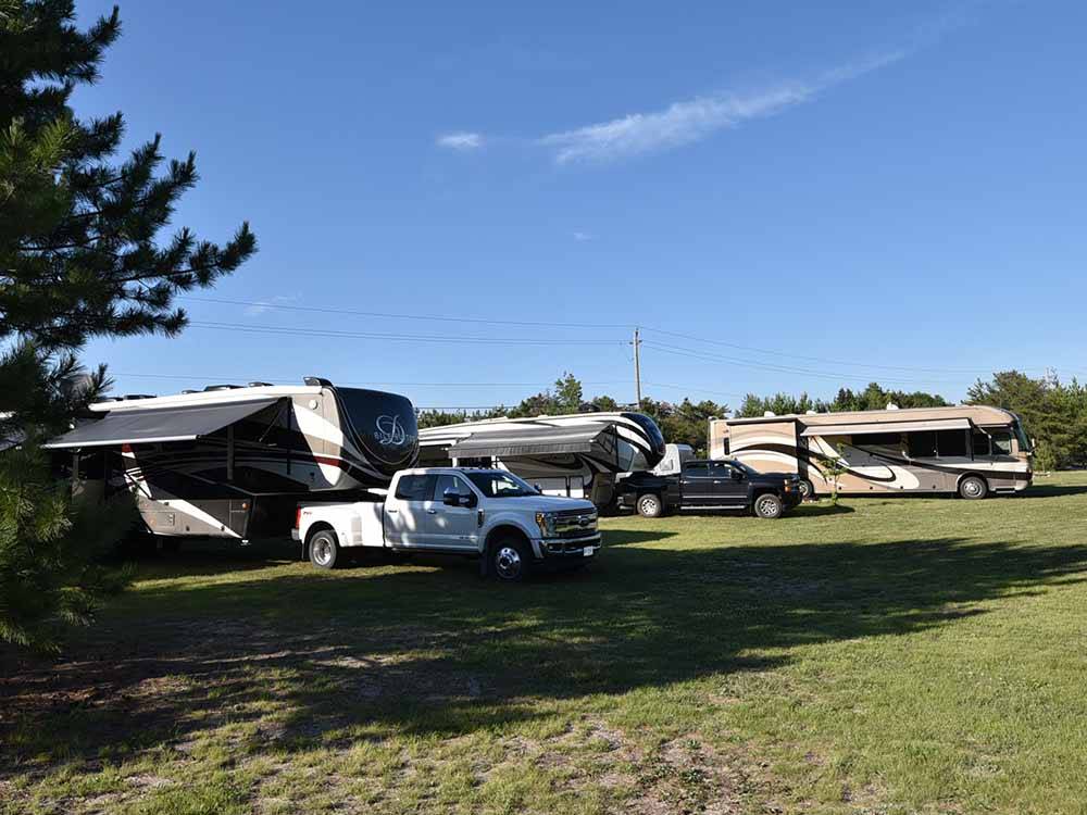RVs parked on the grassy sites at DAVY LAKE CAMPGROUND
