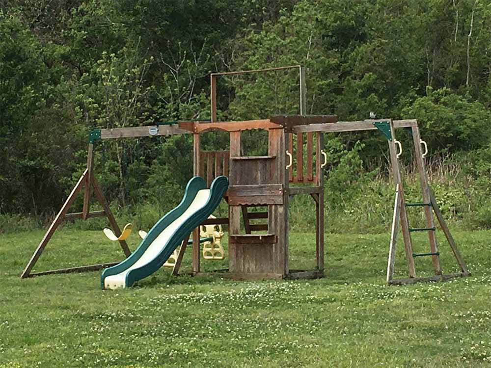 The wooden playground equipment at FROG CITY RV PARK