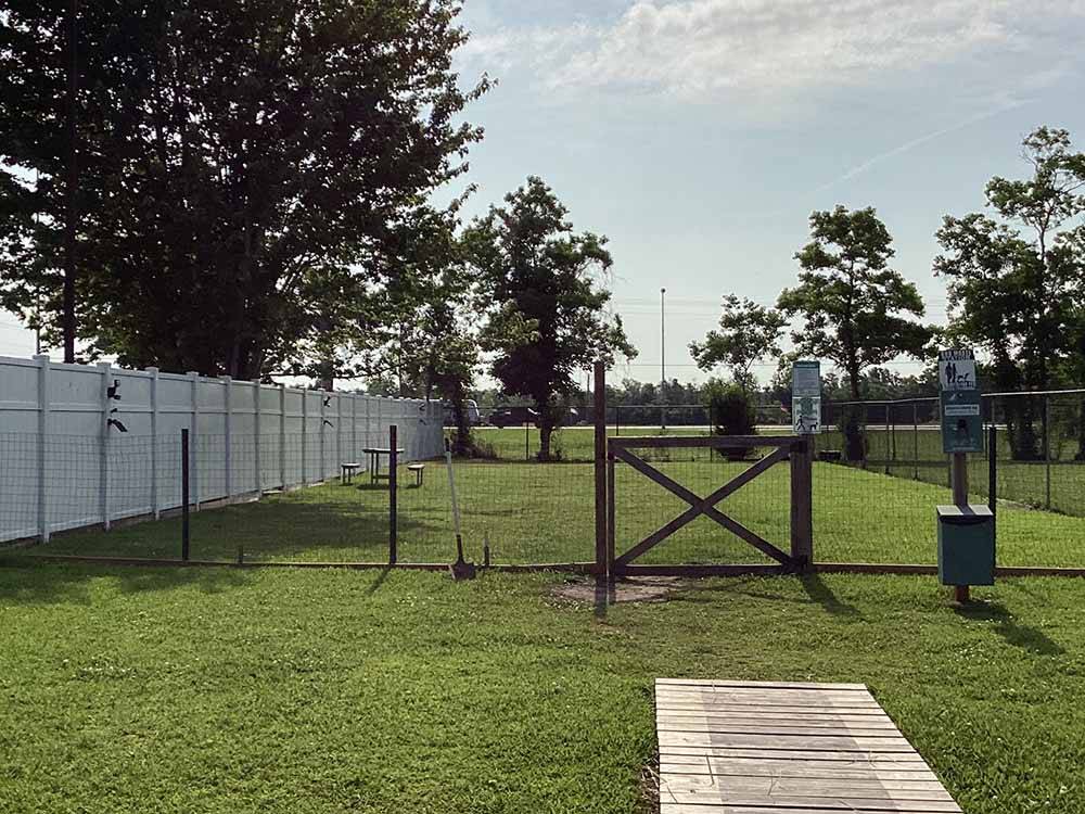 The fenced in pet area at FROG CITY RV PARK