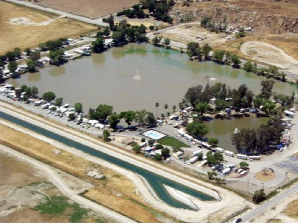 Aerial view of the lake and RV sites at REFLECTION LAKE RV PARK & CAMPGROUND