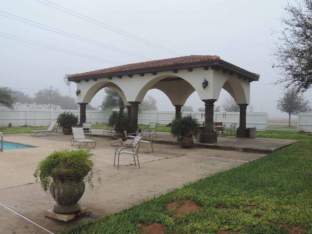The pavilion by the swimming pool at LAZY PALMS RANCH RV PARK