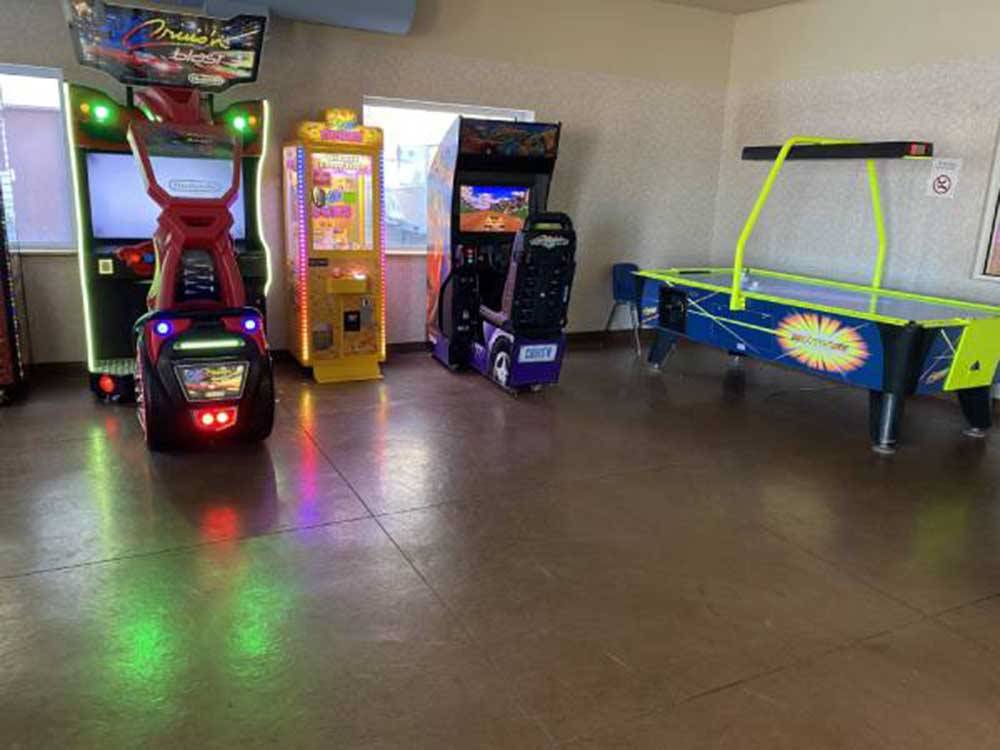 Rec room with games and air hockey table at GOVERNORS' RV PARK CAMPGROUND