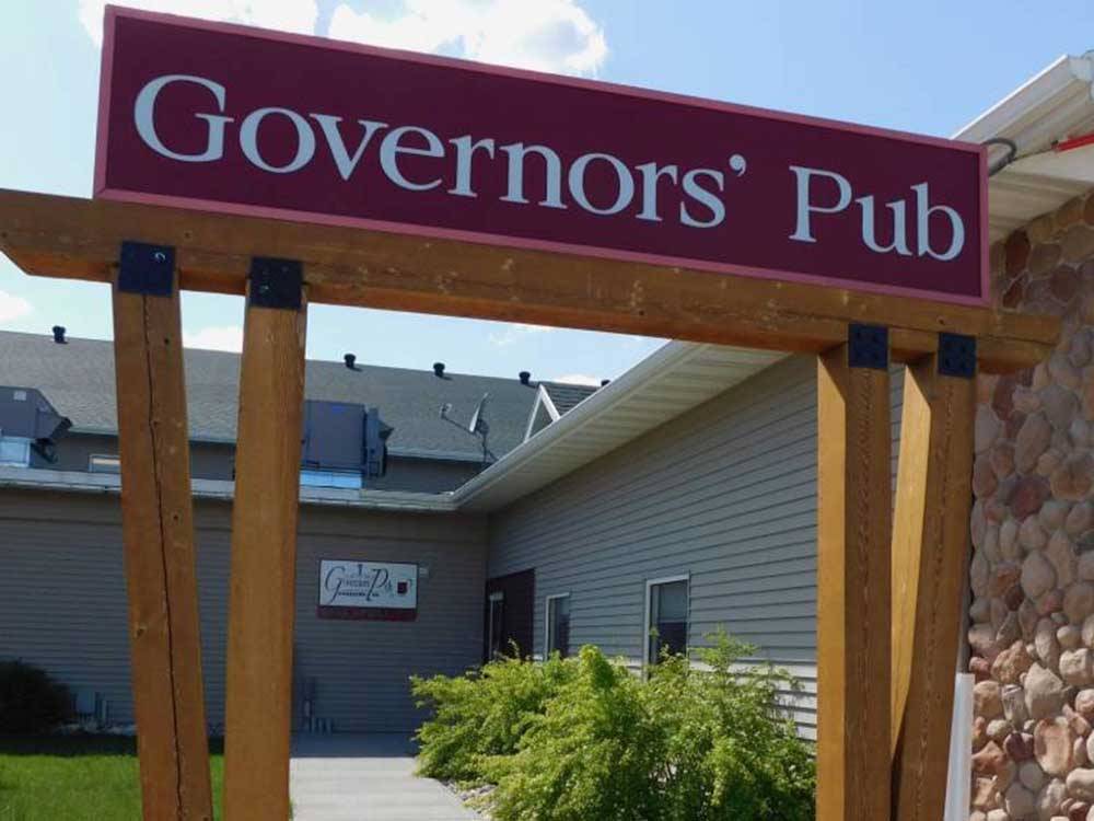 Governors' Pub sign leading to watering hole at GOVERNORS' RV PARK CAMPGROUND