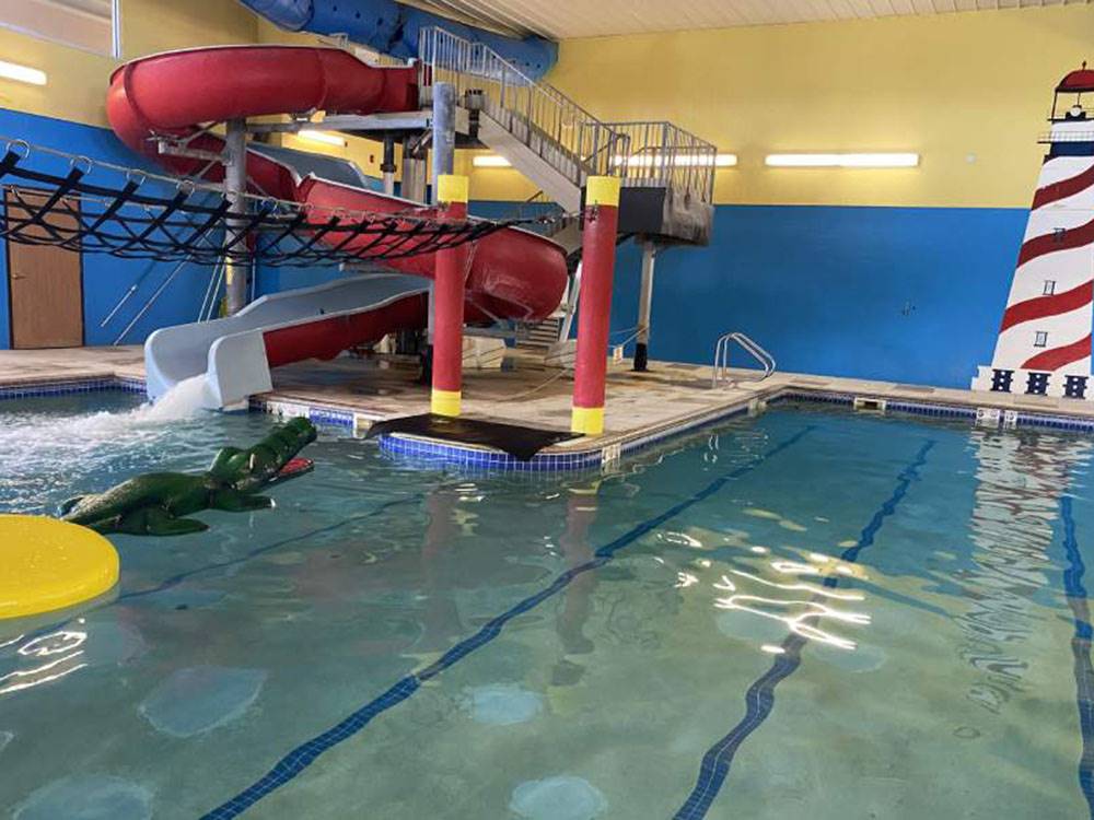 The indoor pool water slide at GOVERNORS' RV PARK CAMPGROUND