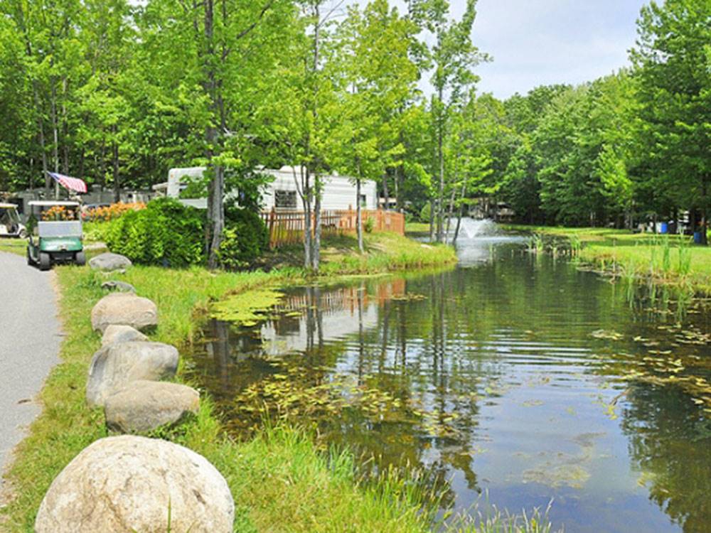 Paved road near the pond at PINEHIRST RV RESORT