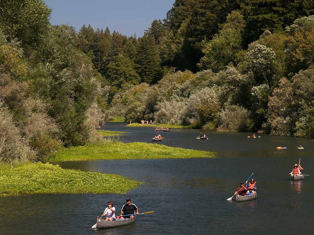 People canoeing down a river at SONOMA COUNTY RV PARK-AT THE FAIRGROUNDS