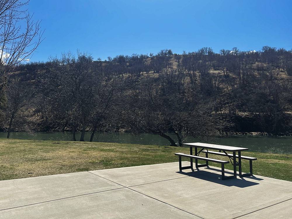 A view of the hills from a paved RV site at Klamath Ranch Resort / Blue Heron RV Park