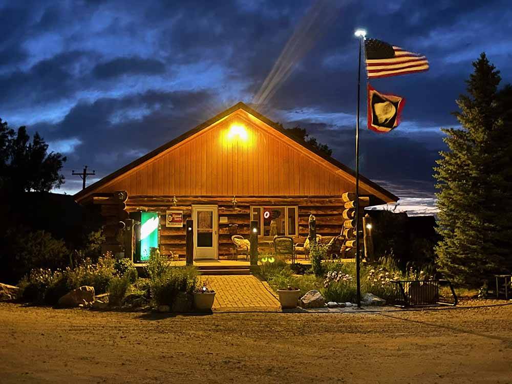 The main lodge office at dusk at TWIN PINES RV PARK & CAMPGROUND