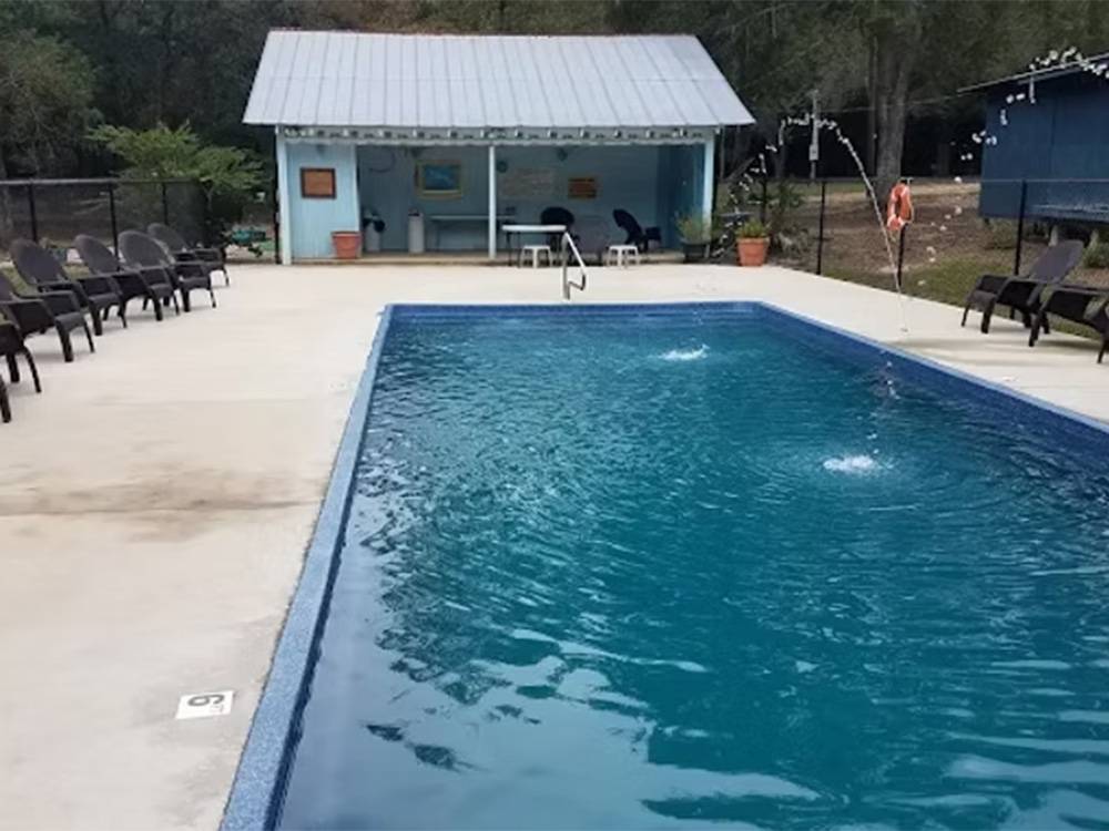 The fenced in swimming pool