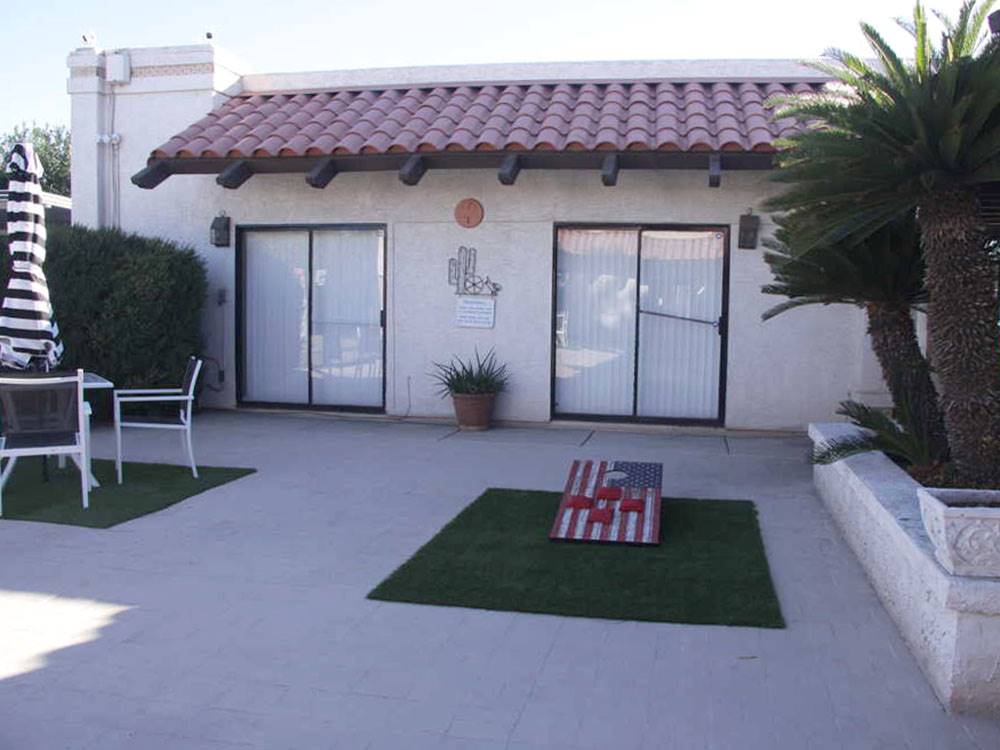 Cornhole by the pool