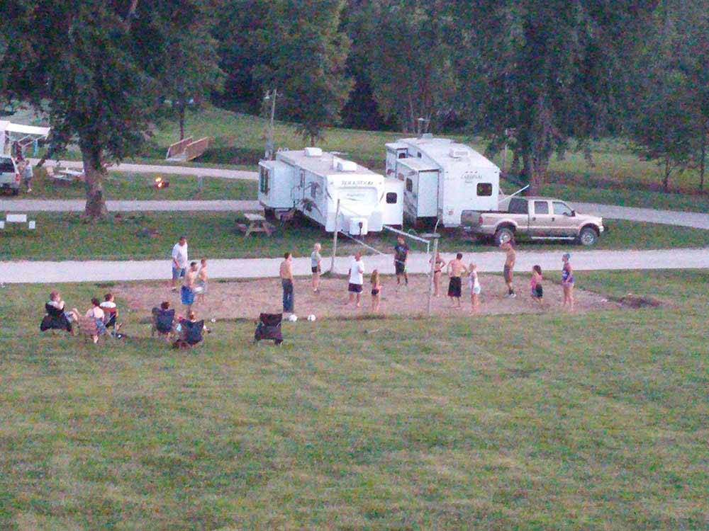 People playing volleyball at AOK CAMPGROUND & RV PARK